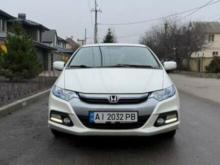 Белый Хонда Инсайт, объемом двигателя 1.34 л и пробегом 175 тыс. км за 8000 $, фото 1 на Automoto.ua