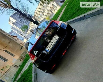 Черный Хонда Инсайт, объемом двигателя 1.3 л и пробегом 299 тыс. км за 6999 $, фото 2 на Automoto.ua