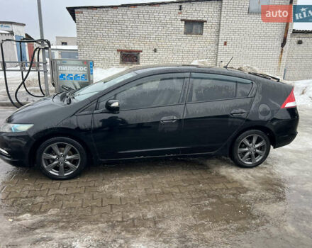 Черный Хонда Инсайт, объемом двигателя 1.34 л и пробегом 213 тыс. км за 6700 $, фото 1 на Automoto.ua