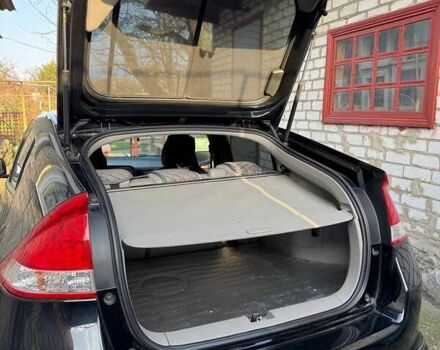 Черный Хонда Инсайт, объемом двигателя 1.34 л и пробегом 177 тыс. км за 9800 $, фото 26 на Automoto.ua