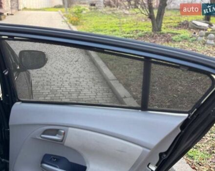 Черный Хонда Инсайт, объемом двигателя 1.34 л и пробегом 177 тыс. км за 9800 $, фото 11 на Automoto.ua