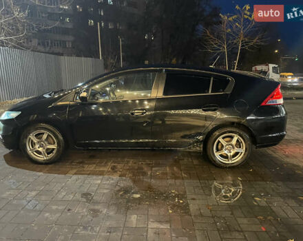 Черный Хонда Инсайт, объемом двигателя 1.34 л и пробегом 216 тыс. км за 6899 $, фото 56 на Automoto.ua