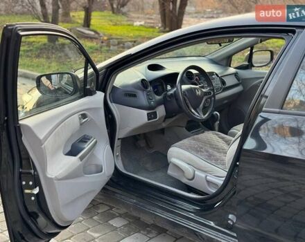 Черный Хонда Инсайт, объемом двигателя 1.34 л и пробегом 177 тыс. км за 9800 $, фото 19 на Automoto.ua