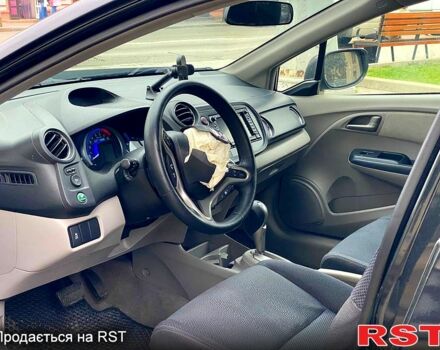 Чорний Хонда Інсайт, об'ємом двигуна 1.3 л та пробігом 172 тис. км за 3500 $, фото 3 на Automoto.ua