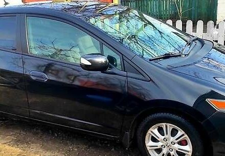 Черный Хонда Инсайт, объемом двигателя 1.3 л и пробегом 242 тыс. км за 7500 $, фото 1 на Automoto.ua