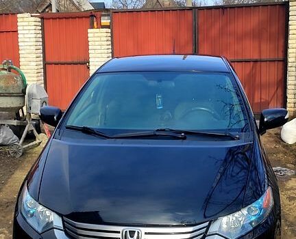 Черный Хонда Инсайт, объемом двигателя 1.3 л и пробегом 242 тыс. км за 7500 $, фото 1 на Automoto.ua