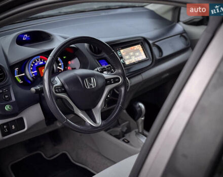 Коричневий Хонда Інсайт, об'ємом двигуна 1.3 л та пробігом 169 тис. км за 7700 $, фото 25 на Automoto.ua