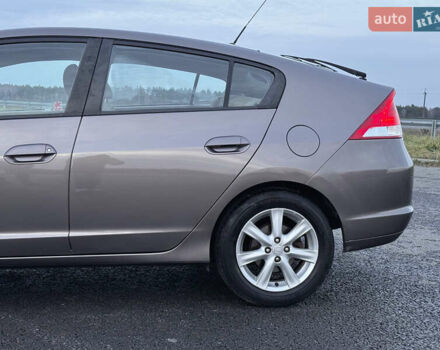 Коричневий Хонда Інсайт, об'ємом двигуна 1.3 л та пробігом 169 тис. км за 7700 $, фото 6 на Automoto.ua