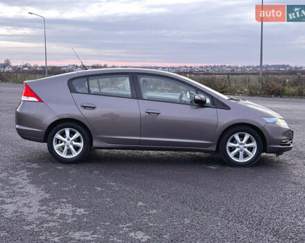 Коричневий Хонда Інсайт, об'ємом двигуна 1.3 л та пробігом 169 тис. км за 7700 $, фото 15 на Automoto.ua