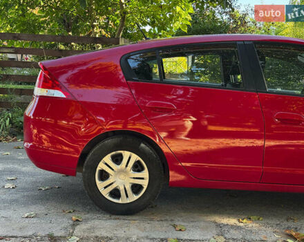 Красный Хонда Инсайт, объемом двигателя 1.3 л и пробегом 248 тыс. км за 6990 $, фото 5 на Automoto.ua