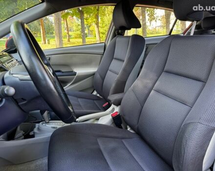 Червоний Хонда Інсайт, об'ємом двигуна 1.3 л та пробігом 248 тис. км за 6990 $, фото 18 на Automoto.ua