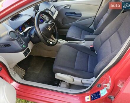Красный Хонда Инсайт, объемом двигателя 1.3 л и пробегом 247 тыс. км за 5700 $, фото 14 на Automoto.ua