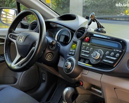 Червоний Хонда Інсайт, об'ємом двигуна 1.3 л та пробігом 248 тис. км за 6990 $, фото 25 на Automoto.ua