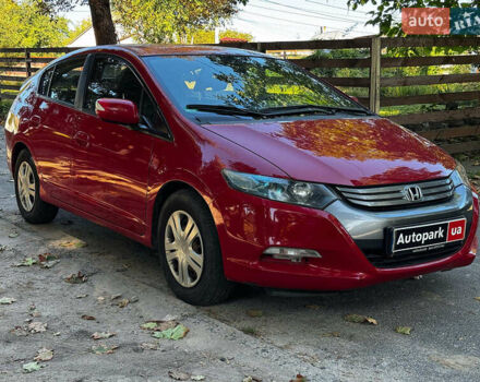 Красный Хонда Инсайт, объемом двигателя 1.3 л и пробегом 248 тыс. км за 6990 $, фото 3 на Automoto.ua