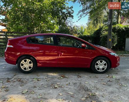Красный Хонда Инсайт, объемом двигателя 1.3 л и пробегом 248 тыс. км за 6990 $, фото 6 на Automoto.ua
