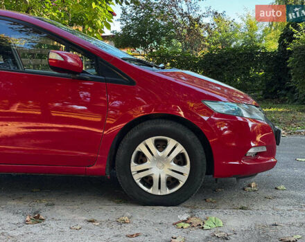 Красный Хонда Инсайт, объемом двигателя 1.3 л и пробегом 248 тыс. км за 6990 $, фото 4 на Automoto.ua