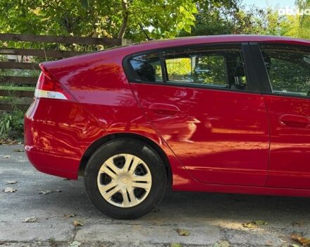 Червоний Хонда Інсайт, об'ємом двигуна 1.3 л та пробігом 248 тис. км за 6990 $, фото 5 на Automoto.ua