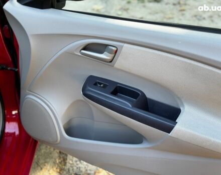 Червоний Хонда Інсайт, об'ємом двигуна 1.3 л та пробігом 248 тис. км за 6990 $, фото 27 на Automoto.ua