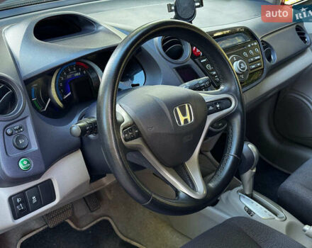 Красный Хонда Инсайт, объемом двигателя 1.3 л и пробегом 248 тыс. км за 6990 $, фото 19 на Automoto.ua
