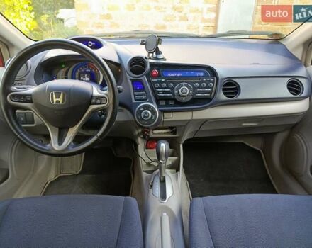 Красный Хонда Инсайт, объемом двигателя 1.3 л и пробегом 247 тыс. км за 5700 $, фото 16 на Automoto.ua