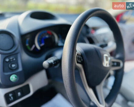 Червоний Хонда Інсайт, об'ємом двигуна 1.3 л та пробігом 37 тис. км за 8550 $, фото 48 на Automoto.ua