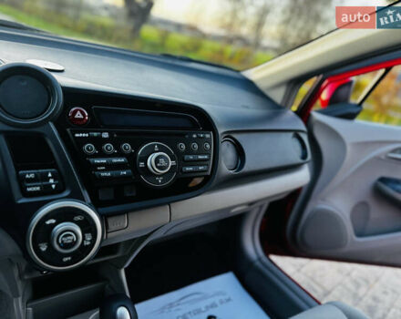 Красный Хонда Инсайт, объемом двигателя 1.3 л и пробегом 37 тыс. км за 8350 $, фото 51 на Automoto.ua