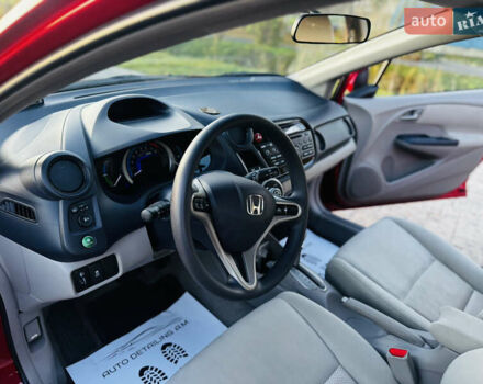 Червоний Хонда Інсайт, об'ємом двигуна 1.3 л та пробігом 37 тис. км за 8550 $, фото 45 на Automoto.ua