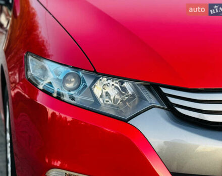 Красный Хонда Инсайт, объемом двигателя 1.3 л и пробегом 37 тыс. км за 8499 $, фото 21 на Automoto.ua