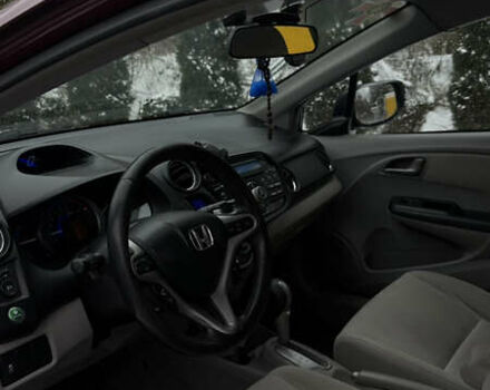 Красный Хонда Инсайт, объемом двигателя 1.34 л и пробегом 229 тыс. км за 6900 $, фото 8 на Automoto.ua