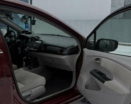 Красный Хонда Инсайт, объемом двигателя 1.34 л и пробегом 229 тыс. км за 6900 $, фото 14 на Automoto.ua