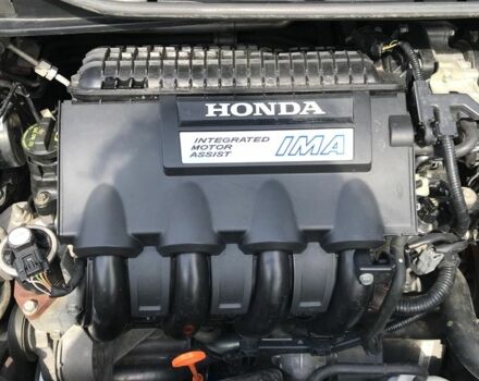 Красный Хонда Инсайт, объемом двигателя 0.13 л и пробегом 230 тыс. км за 6500 $, фото 6 на Automoto.ua