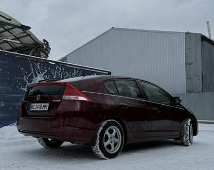 Красный Хонда Инсайт, объемом двигателя 1.34 л и пробегом 229 тыс. км за 6900 $, фото 6 на Automoto.ua