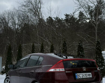 Красный Хонда Инсайт, объемом двигателя 1.34 л и пробегом 229 тыс. км за 6900 $, фото 11 на Automoto.ua