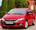 Червоний Хонда Інсайт, об'ємом двигуна 1.4 л та пробігом 209 тис. км за 8600 $, фото 1 на Automoto.ua