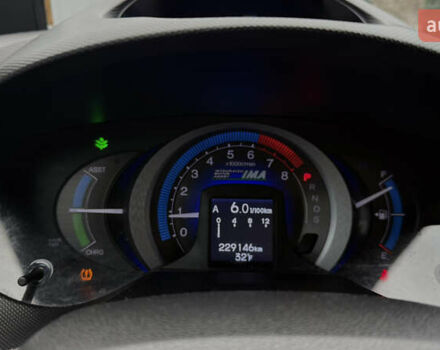 Красный Хонда Инсайт, объемом двигателя 1.34 л и пробегом 229 тыс. км за 6900 $, фото 7 на Automoto.ua