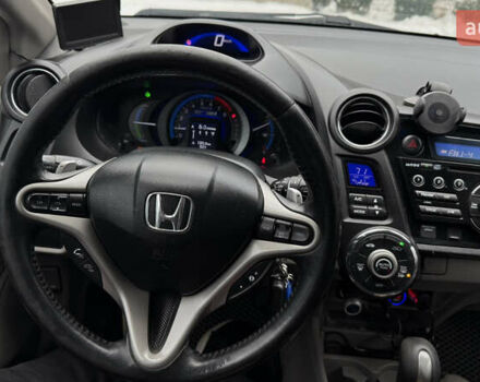 Красный Хонда Инсайт, объемом двигателя 1.34 л и пробегом 229 тыс. км за 6900 $, фото 13 на Automoto.ua