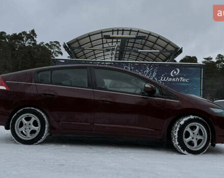 Красный Хонда Инсайт, объемом двигателя 1.34 л и пробегом 229 тыс. км за 6900 $, фото 3 на Automoto.ua