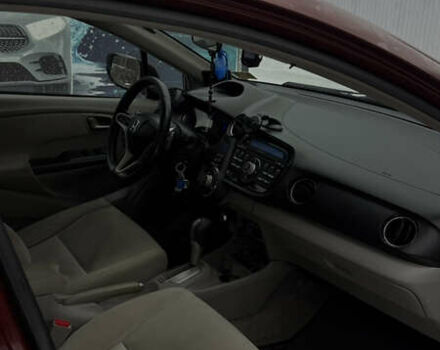 Красный Хонда Инсайт, объемом двигателя 1.34 л и пробегом 229 тыс. км за 6900 $, фото 16 на Automoto.ua