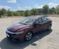 Красный Хонда Инсайт, объемом двигателя 1.5 л и пробегом 74 тыс. км за 17000 $, фото 1 на Automoto.ua