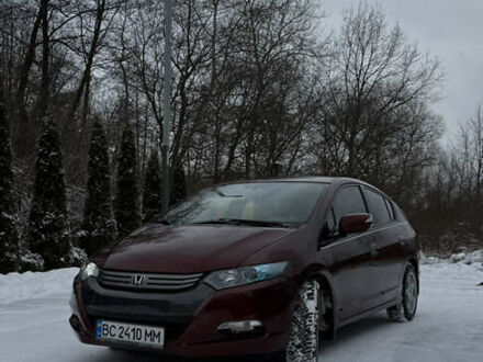 Красный Хонда Инсайт, объемом двигателя 1.34 л и пробегом 229 тыс. км за 6900 $, фото 1 на Automoto.ua