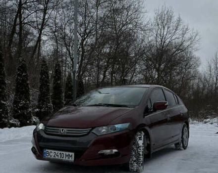 Красный Хонда Инсайт, объемом двигателя 1.34 л и пробегом 229 тыс. км за 6900 $, фото 1 на Automoto.ua