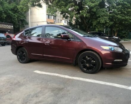 Красный Хонда Инсайт, объемом двигателя 1.3 л и пробегом 208 тыс. км за 4300 $, фото 1 на Automoto.ua