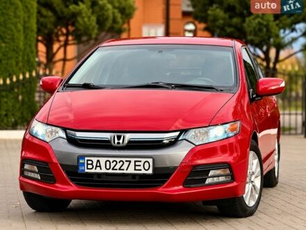 Червоний Хонда Інсайт, об'ємом двигуна 1.4 л та пробігом 209 тис. км за 8600 $, фото 1 на Automoto.ua