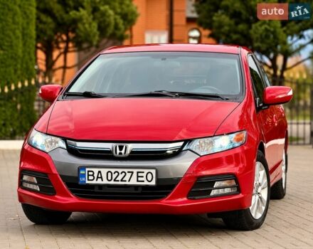 Червоний Хонда Інсайт, об'ємом двигуна 1.4 л та пробігом 209 тис. км за 8600 $, фото 1 на Automoto.ua