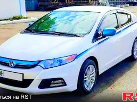 Хонда Инсайт, объемом двигателя 13 л и пробегом 250 тыс. км за 8000 $, фото 1 на Automoto.ua