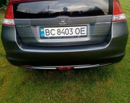 Серый Хонда Инсайт, объемом двигателя 1.34 л и пробегом 228 тыс. км за 8000 $, фото 4 на Automoto.ua