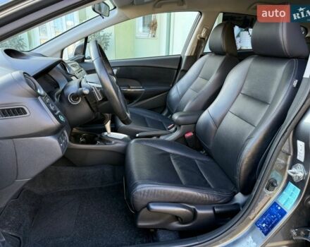 Серый Хонда Инсайт, объемом двигателя 1.3 л и пробегом 177 тыс. км за 10000 $, фото 57 на Automoto.ua