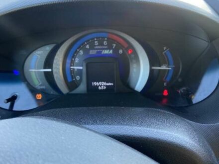 Серый Хонда Инсайт, объемом двигателя 1.34 л и пробегом 317 тыс. км за 5800 $, фото 1 на Automoto.ua