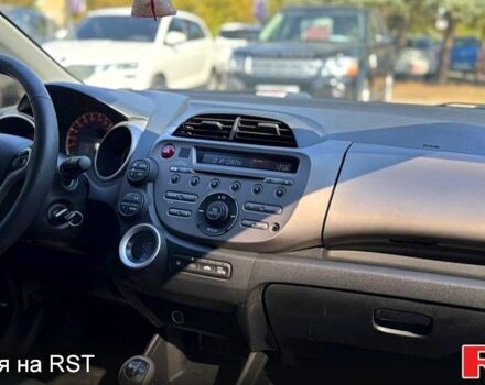 Белый Хонда Джаз, объемом двигателя 1.3 л и пробегом 200 тыс. км за 6500 $, фото 1 на Automoto.ua