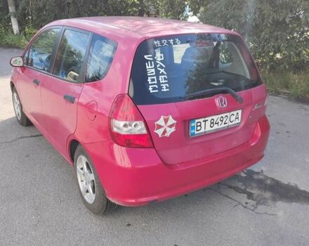 Красный Хонда Джаз, объемом двигателя 1.3 л и пробегом 295 тыс. км за 4555 $, фото 1 на Automoto.ua